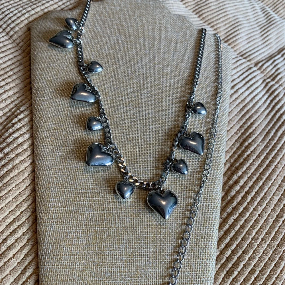 Juicy heart belly chain. Silver tone. Great condition.